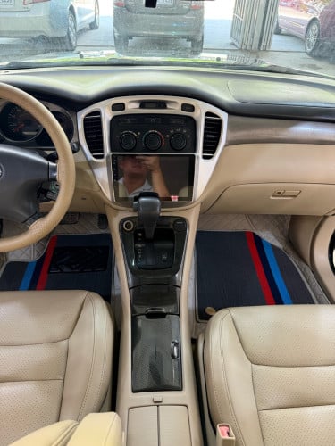 Highlander 02 V6 បេីកបូល