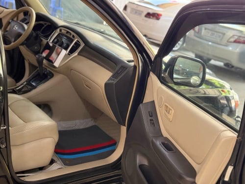 Highlander 02 V6 បេីកបូល