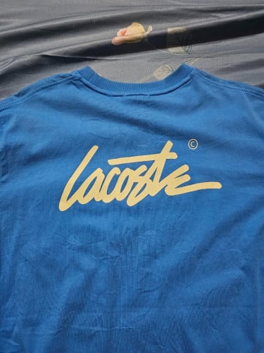 Lacoste Polo Shirt – Size M – Used (Good Condition)