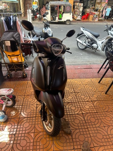 ម៉ូតូអ្នកជិះ
