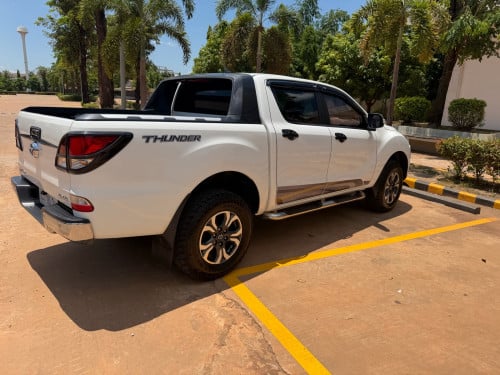 BT50ម៉ាសុីនធំអូតូប៉ុង២ឆ្វេងហ្សុីន