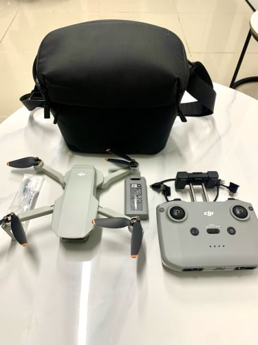 Drone dji mini 4K មួយទឹកនៅស្អាត99%គ្មានកន្លែងទាស់