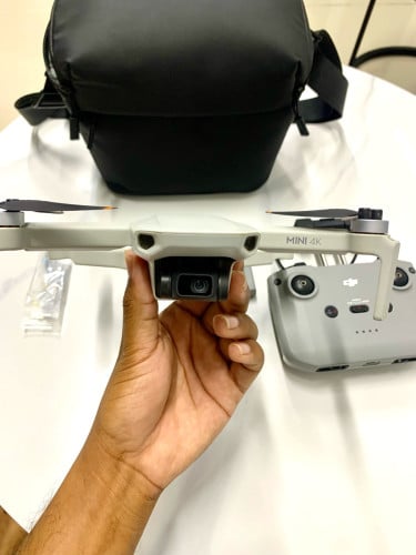 Drone dji mini 4K មួយទឹកនៅស្អាត99%គ្មានកន្លែងទាស់