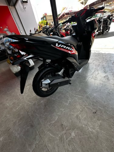 ម៉ូតូក្រដាស់ពន្ធ