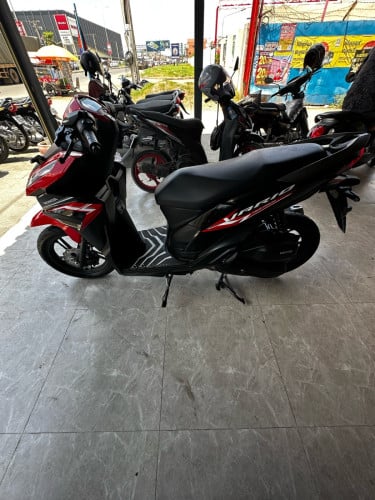 ម៉ូតូក្រដាស់ពន្ធ