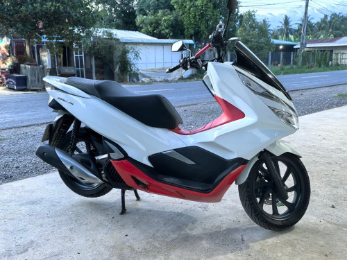 ម៉ូតូស្អាត