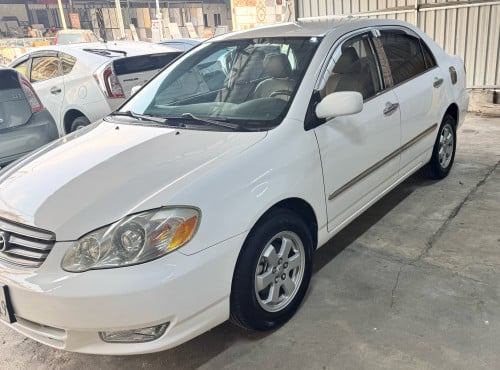Corolla 03 ឡានកាលីក្នុងលឿងធានាឡានស្អាតអត់ដូរពណ៌អត់កាត់តឡានស្អាត អត់បុក