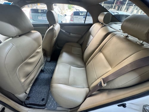 Corolla 03 ឡានកាលីក្នុងលឿងធានាឡានស្អាតអត់ដូរពណ៌អត់កាត់តឡានស្អាត អត់បុក