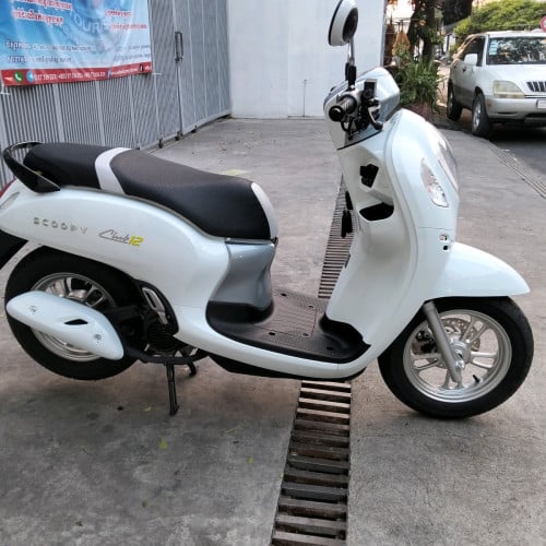 ម៉ូតូ scoopy 023 ក្រុមហ៊ុនឈ្មោះម្ចាស់ដើមលក់តម្លៃ 1990 ដុល្លារ។