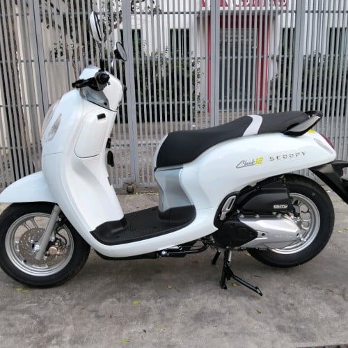 ម៉ូតូ scoopy 023 ក្រុមហ៊ុនឈ្មោះម្ចាស់ដើមលក់តម្លៃ 1990 ដុល្លារ។
