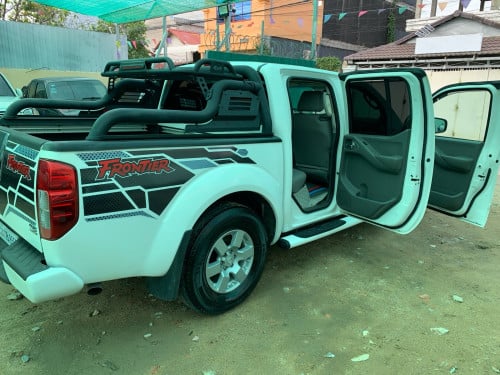 Nissan Frontier ឆ្នាំ 05 ប៉ុង1 សាំង + ហ្គាស