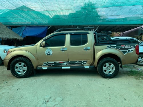 Nissan Frontier ឆ្នាំ 05 ប៉ុង1 សាំង + ហ្គាស