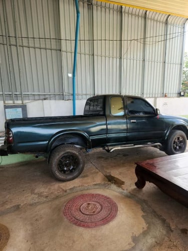 TACOMA ឆ្នាំ1997 តួរខ្ពស់  អូតូ ប៉ុង2 កាំពីតាស សាំងសុទ្ធ