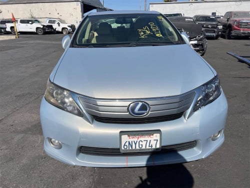 18700$ Lexus HS 250h 010 option premium (haft full)