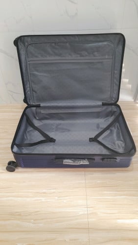 Brand new L suitcase