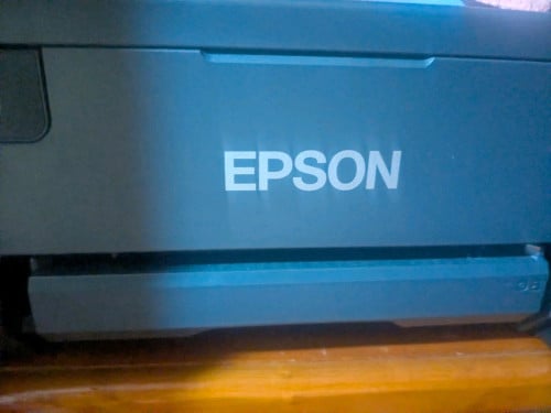 Epson EcoTank L8058 photo printer featuring a 6-color ink system.