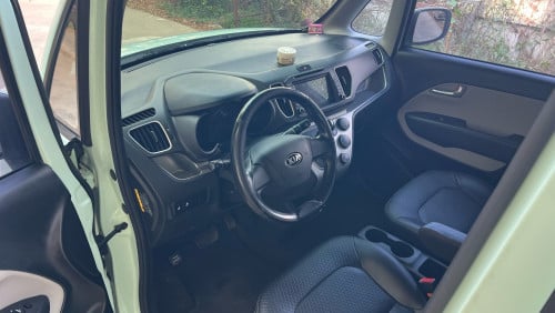 Kia Ray 013 ក្រដាស់ពន្ធ