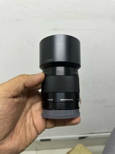 Len 50mm F1.8 OSS 135$
