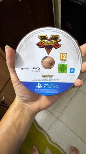 Sale or trade Street Fighter V 99% no box