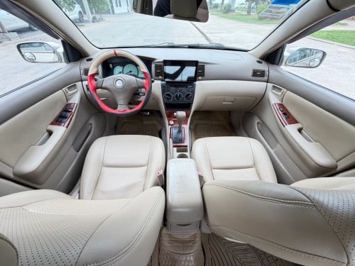 នៅស្អាត សានុំ Corolla 2004