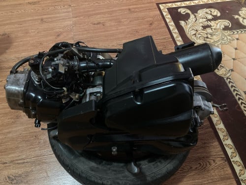 ម៉ាសុីន scoopy 015 មានប្រព័ន្ធភ្លេីងមួយឈុត