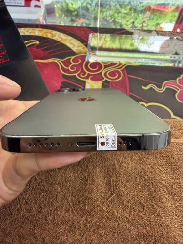 iPhone 12 ProMax 128G color Black ថ្ម100% ឡុកអុីសុីម (ប្រើបានសុីម2)