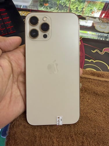 iPhone 12 ProMax 128G color Gold ថ្ម100% ឡុកអុីសុីម (ប្រើបានសុីម2)