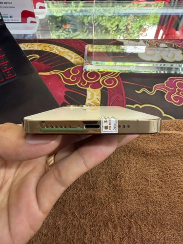 iPhone 12 ProMax 128G color Gold ថ្ម100% ឡុកអុីសុីម (ប្រើបានសុីម2)