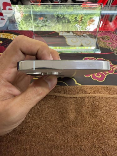 iPhone 12 ProMax 128G color white ថ្ម77% ឡុកអុីសុីម (ប្រើបានសុីម2)