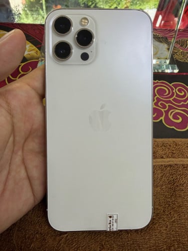 iPhone 12 ProMax 128G color white ថ្ម77% ឡុកអុីសុីម (ប្រើបានសុីម2)