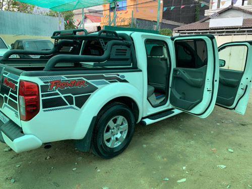 Nissan Frontier ឆ្នាំ 05 ប៉ុង1 សាំង + ហ្គាស