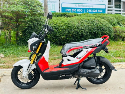 HONDA Zoomer X 018 ក្រុមហ៊ុន ម៉ាសុីនតាន់ហាប់នែនស្ងាត់ជិះស្រួលមិនលាន់មិនហុយមានពន្ធកាតគ្រឺហ្សីន
