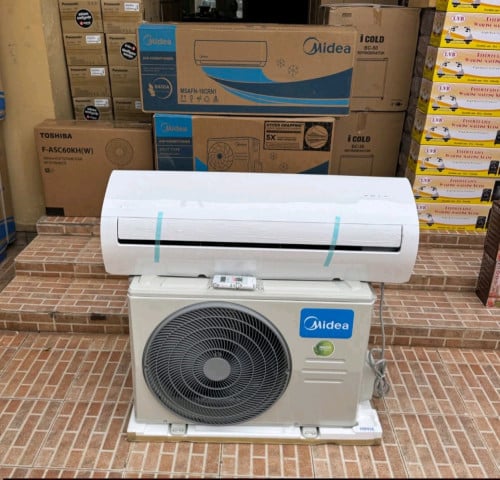 មានលក់ម៉ាស៊ីនត្រជាក់ Midea 2 hp Mono ថែមជើង