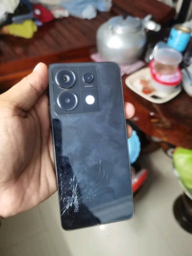 ចង់លក់ Redmi note 13 pro 5G ch version សំណុំបែកខ្នងលួចរូប