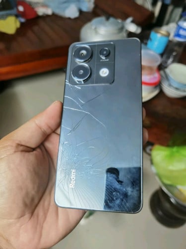 ចង់លក់ Redmi note 13 pro 5G ch version សំណុំបែកខ្នងលួចរូប