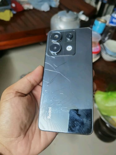 ចង់លក់ Redmi note 13 pro 5G ch version សំណុំបែកខ្នងលួចរូប