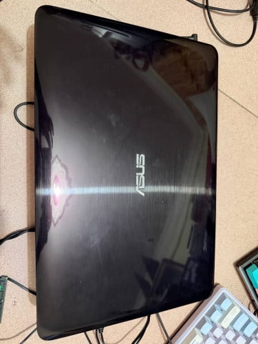 ASUS A556U លក់70$ នៅដំណើរការធម្មតា