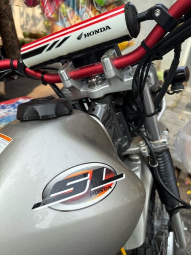 SL ក្រដាស់ពន្ធ លំដាប់មេម៉ូតូ
