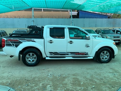 Nissan Frontier ឆ្នាំ 05 ប៉ុង1 សាំង + ហ្គាស