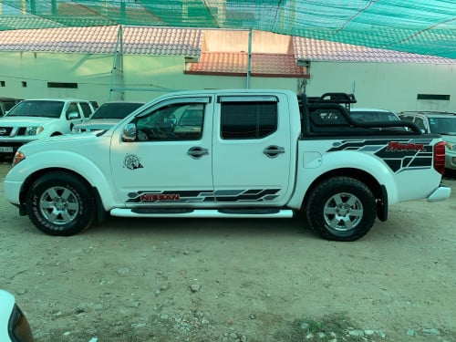 Nissan Frontier ឆ្នាំ 05 ប៉ុង1 សាំង + ហ្គាស