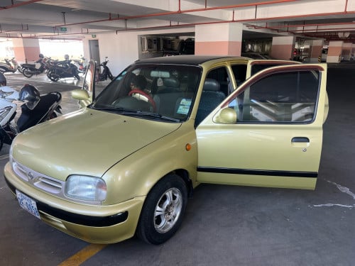 Nissan March year 1998 Location Phnom Penh.