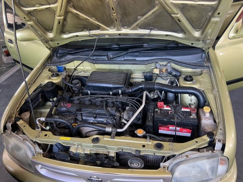 Nissan March year 1998 Location Phnom Penh.