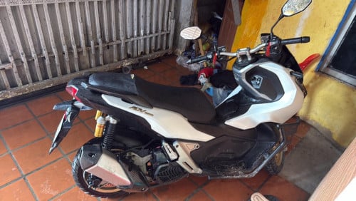 Motor ADV 021 ម្ចាស់ដើម