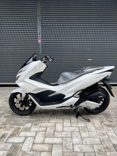 Honda PCX 020 ក្រដាស់ពន្ធ