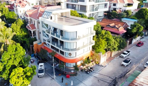 CORNER COMMERCIAL BUILDING FOR SALE IN TK