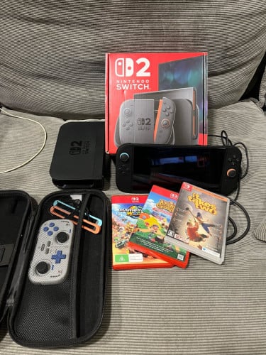Nintendo Switch 2 + Case + 3 Games + additional INE controller