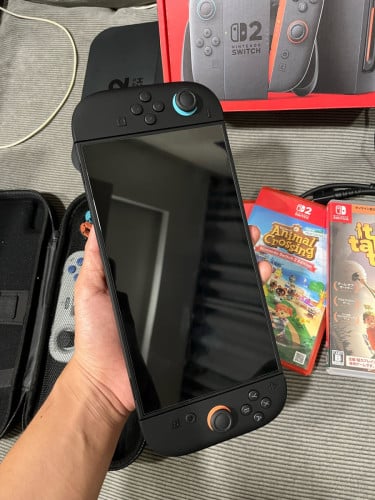 Nintendo Switch 2 + Case + 3 Games + additional INE controller