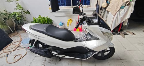 ម៉ូតូលក់ Honda PCX 2014 ជប៉ុនសុទ្ធ ជិះផ្ទាល់ មានកាតត្រឹមត្រូវ