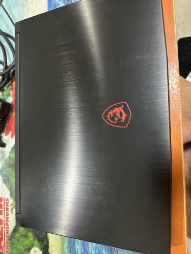 MSI GF63 Thin តួមានស្នាមតិចៗដូចក្នុងរូប អត់ធ្លាប់ជួសជុល
