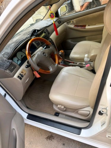 Corolla 03LEក្នុងលឿងធានាជួនឡានសំណុំហ្ស៊ីន